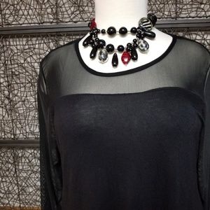 Black top with sheer shoulders and arms